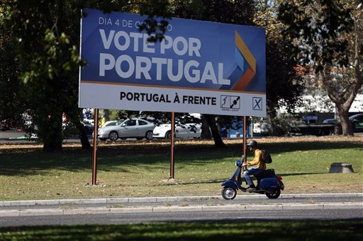 Austerity campaign pays off as Portugal"s centre-right edges into new term - VIDEO